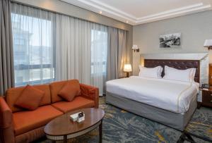 Giường trong phòng chung tại Ruve Al Madinah Hotel +53 ảnh