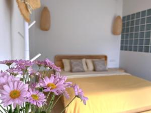 Postel nebo postele na pokoji v ubytování Lalaland