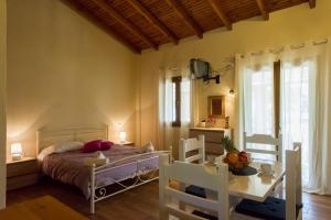 Posteľ alebo postele v izbe v ubytovaní Renata Rooms & Studios