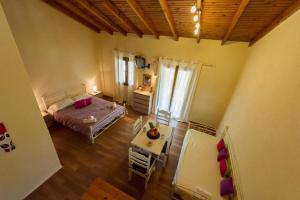 Posteľ alebo postele v izbe v ubytovaní Renata Rooms & Studios