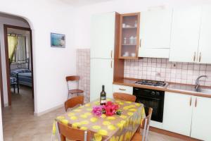 Kuchyň nebo kuchyňský kout v ubytování Residenza La Vigna