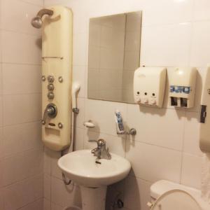 Koupelna v ubytování K Motel + 37 fotografií