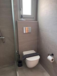 Ένα μπάνιο στο House of Harmony Comfort Studio Stefanos