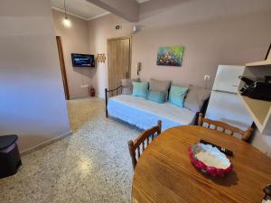 Katil atau katil-katil dalam bilik di Lilia Apartments A2