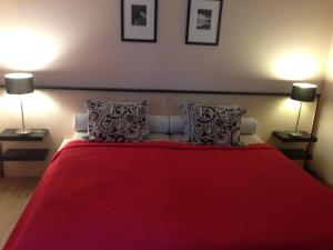 מיטה או מיטות בחדר ב-Albatrosz Apartman