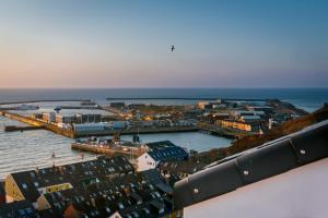 an aerial view of a city with a harbor at Hotel auf den Hummerklippen in Helgoland