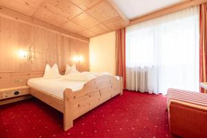 Posteľ alebo postele v izbe v ubytovaní Alpenpension Pfurtscheller
