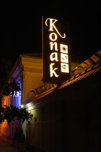 a sign for a hotel on the side of a building at Konak Požarevac in Požarevac
