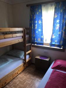 Postel nebo postele na pokoji v ubytování Mooswirt