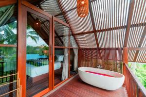 Fotografie z fotogalerie ubytování The Suarsena Escape by WAHM Hotel Management v Ubudu