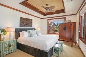 Rúm í herbergi á ❤PiH❤ OCEAN BREEZE Panoramic Ocean View Mauna Kea Resort Optional Privileges