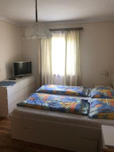 Llit o llits en una habitació de Mooswirt