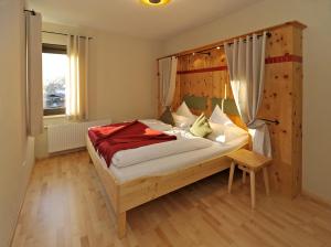 Foto da galeria de Ortners Mauerwirt Zirbenapartments em Bad Kleinkirchheim