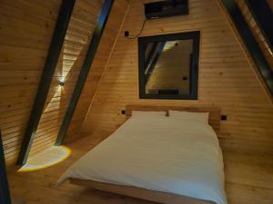 Postel nebo postele na pokoji v ubytování Dream Place Resort + 13 fotografií