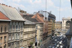 a view of a city street with cars and buildings at Fanni Budapest Guesthouse in Budapest