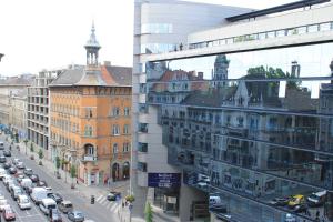 a view of a city street with cars and buildings at Fanni Budapest Guesthouse in Budapest