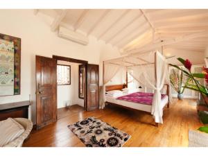 Rúm í herbergi á Pool, Roof Terrace, 3 Bedroom Villa, Galle Fort
