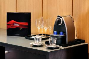 Příslušenství pro přípravu čaje a kávy v ubytování Palace Bonanza Playa Resort & SPA by Olivia Hotels Collection