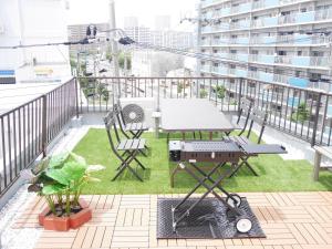 En balkon eller terrasse på ホテル北港通