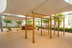 a park with a playground in a building at Burj Khalifa View - Burj royale - Downtown - DUBAI 3BR in Dubai
