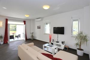 Telewizja i/lub zestaw kina domowego w obiekcie Villa Tea