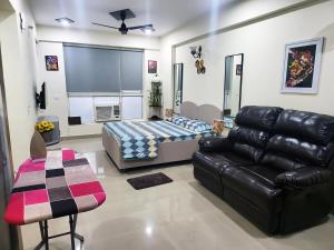 Χώρος καθιστικού στο Urban Nest Homestays
