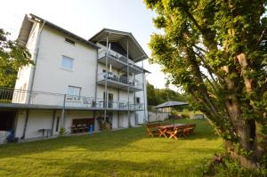 Un jardín fuera de Ferienappartements Pfeil