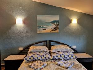 Posteľ alebo postele v izbe v ubytovaní Villa Aquamarina 600 m vom Meer, Casa in Miami Platja, Ferienhaus mit Garten, WLAN, Garage, Terrasse, Grill