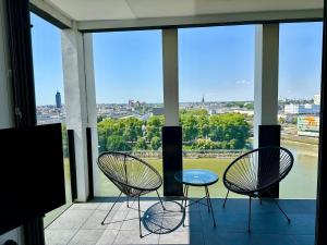Balkón alebo terasa v ubytovaní Appartement standing Vue panoramique sur Nantes