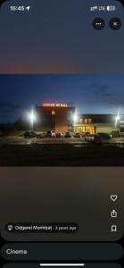 a picture of a store at night with lights at 50100 Event Hall in Ongon