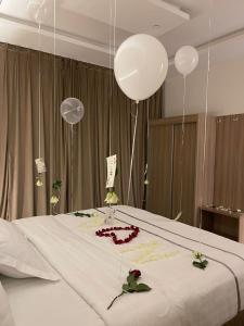 Ένα ή περισσότερα κρεβάτια σε δωμάτιο στο فندق قمم بارك 3 Qimam Park Hotel