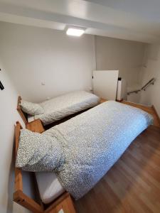 Ένα ή περισσότερα κρεβάτια σε δωμάτιο στο Séjour cosy proche mer