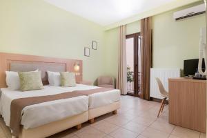 Gulta vai gultas numurā naktsmītnē Hotel Leto Delphi