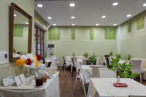 Restorāns vai citas vietas, kur ieturēt maltīti, naktsmītnē Hotel Leto Delphi