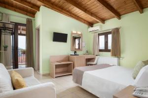 Gulta vai gultas numurā naktsmītnē Hotel Leto Delphi