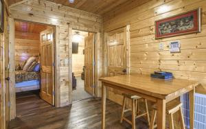 Voodi või voodid majutusasutuse Rockytop Hideaway toas