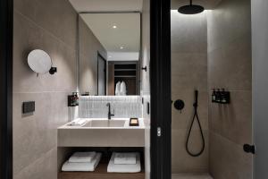 Vannituba majutusasutuses Mosay All Suite Hotel
