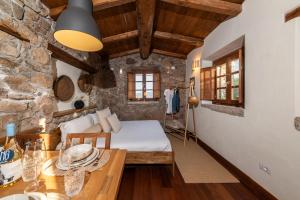 Postel nebo postele na pokoji v ubytování L'isola che non c'è NG Collection + 69 fotografií