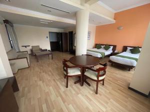 Letto o letti in una camera di Airport Hotel