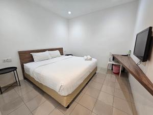 TV a/nebo společenská místnost v ubytování T Hotel Tandop