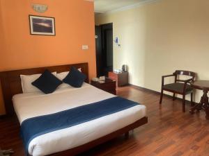 Letto o letti in una camera di Airport Hotel