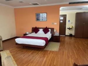 Letto o letti in una camera di Airport Hotel