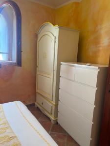 Postel nebo postele na pokoji v ubytování I Mari Di Gallura Suites and Rooms