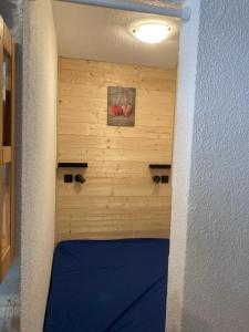Postel nebo postele na pokoji v ubytování Kandahar 202 - Les Deux Alpes- Plein centre-station, 32m2