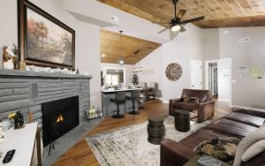 a living room with a couch and a fireplace at Ogle Haven in Gatlinburg