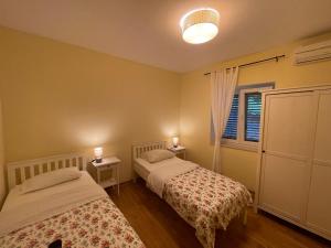Ένα ή περισσότερα κρεβάτια σε δωμάτιο στο Apartment Olivia