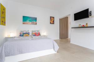 A television and/or entertainment centre at Apartment Fantastico 2