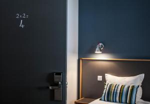 Postel nebo postele na pokoji v ubytování Hotel Balea