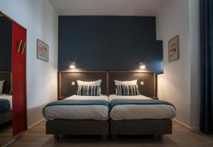 Postel nebo postele na pokoji v ubytování Hotel Balea