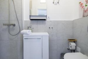 Ένα μπάνιο στο Cozy Residence